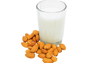 A photo of almonds and almond milk