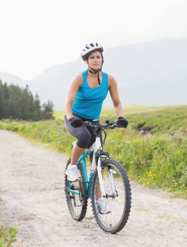 A woman on a mountain bike