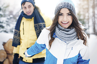 A couple walking in the snow